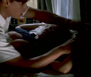 Topless Hollywood Scene | Erika Eleniak - CHASERS (1994)