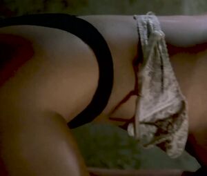 Topless Hollywood Scene | Erika Eleniak - CHASERS (1994)