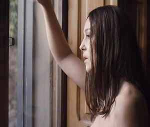 Topless actress Monica Bellucci - That Summer International (2011)