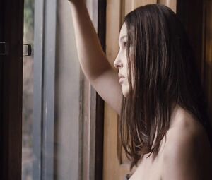 Topless actress Monica Bellucci - That Summer International (2011)