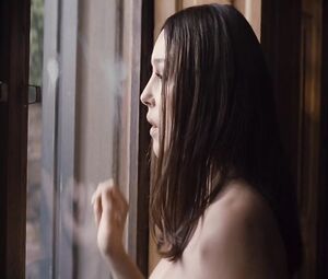 Topless actress Monica Bellucci - That Summer International (2011)