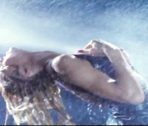 Topless actress Pamela Anderson Nude - Barb Wire (1996) Striptease