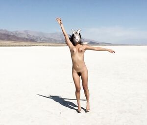 Naked Asian Art Performance of a beach