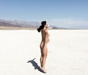 Naked Asian Art Performance of a beach