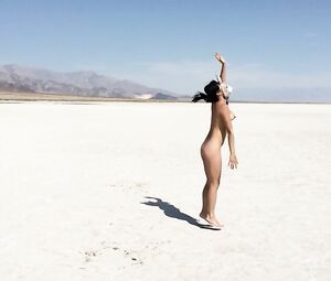Naked Asian Art Performance of a beach