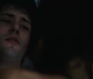 Suggestive woman actor in explicit moments from erotic movie where she has sex