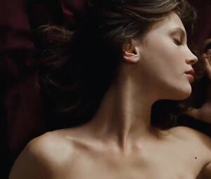 Suggestive woman actor in explicit moments from erotic movie where she has sex