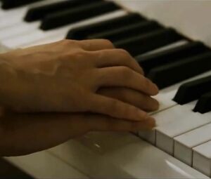 Asian piano teacher takes students hands and puts on small tits in Korean feature movie