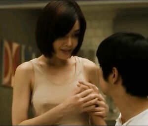 Asian piano teacher takes students hands and puts on small tits in Korean feature movie