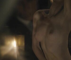 Director focuses on Sonya Cullingford's nice boobies showing them in The Danish Girl