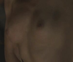 Director focuses on Sonya Cullingford's nice boobies showing them in The Danish Girl