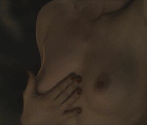 Director focuses on Sonya Cullingford's nice boobies showing them in The Danish Girl