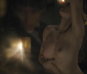 Director focuses on Sonya Cullingford's nice boobies showing them in The Danish Girl