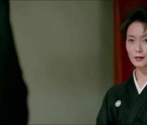 Girl doesn't get murdered by hitman but drilled in bed in retro film Crying Freeman (1995)