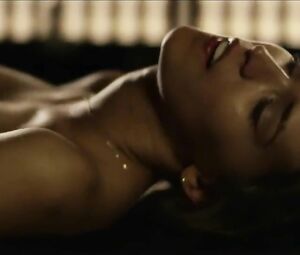 Silvie Deluxe nude gets down on her knees and sucks before cock-riding in Burning (2013)