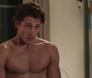 Tempting actress watches handsome young man getting naked and throws herself at him