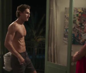Tempting actress watches handsome young man getting naked and throws herself at him