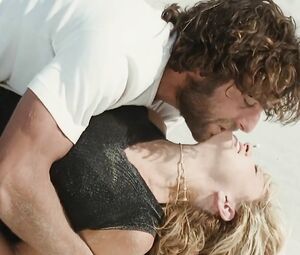 Madonna nude trusts guy with body and makes it on the beach in Swept away (2002)