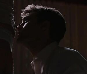 Dakota Johnson shows off tiny boobies and hooks up with guy in Fifty Shades of Grey