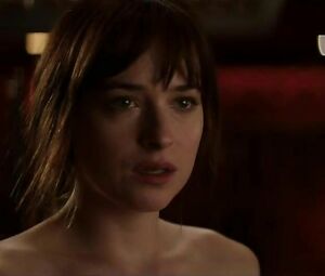 Dakota Johnson shows off tiny boobies and hooks up with guy in Fifty Shades of Grey