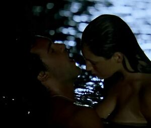 Kelly Brook flirts with the brutal young man and has hard sex in Survival Island