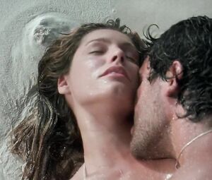 Kelly Brook flirts with the brutal young man and has hard sex in Survival Island