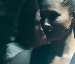 Girl with black hair is attacked by two naked co-stars in Return to House on Haunted Hill