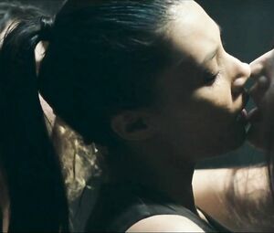 Girl with black hair is attacked by two naked co-stars in Return to House on Haunted Hill