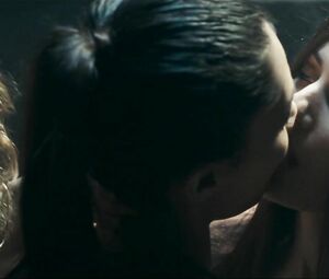 Girl with black hair is attacked by two naked co-stars in Return to House on Haunted Hill