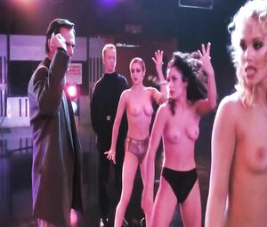 Strippers Elizabeth Berkley and Gina Gershon excite men and chicks in Showgirls (1995)