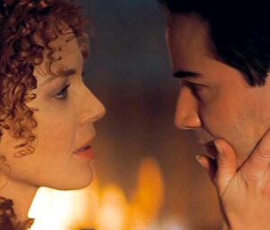 Redhead Connie Nielsen exposes body in celebs video scene from The Devil's Advocate