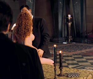 Redhead Connie Nielsen exposes body in celebs video scene from The Devil's Advocate