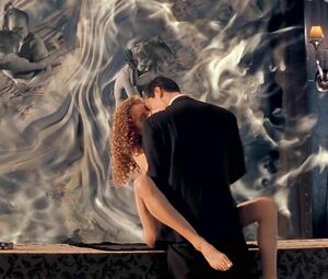 Redhead Connie Nielsen exposes body in celebs video scene from The Devil's Advocate