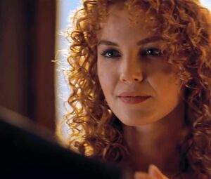 Redhead Connie Nielsen exposes body in celebs video scene from The Devil's Advocate