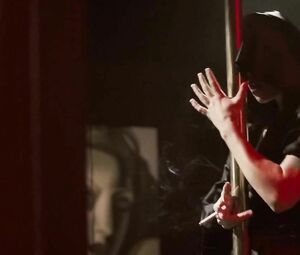 Jessica Biel dances but man watches her and waits in private room in Powder Blue (2009)