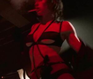 Jessica Biel dances but man watches her and waits in private room in Powder Blue (2009)