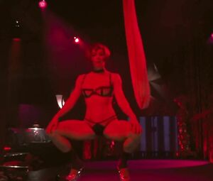 Jessica Biel dances but man watches her and waits in private room in Powder Blue (2009)