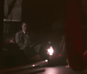 Jessica Biel dances but man watches her and waits in private room in Powder Blue (2009)