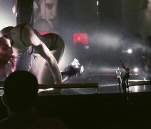 Jessica Biel dances but man watches her and waits in private room in Powder Blue (2009)