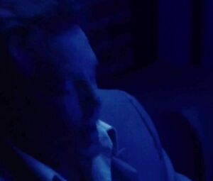 Jessica Biel dances but man watches her and waits in private room in Powder Blue (2009)
