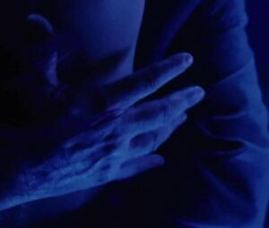Jessica Biel dances but man watches her and waits in private room in Powder Blue (2009)