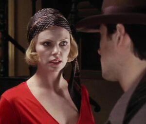 Young man hooks up with shameful blonde actress Charlize Theron in Head in the Clouds