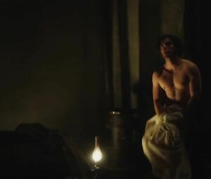 In Secret scene where man with long hair makes it with Elizabeth Olsen and she cums (2013)