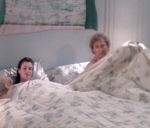 Kelly LeBrock nude - The Woman in Red (1984)