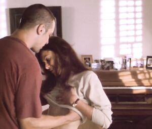 Kari Wuhrer naked - King of the Ants (2003)